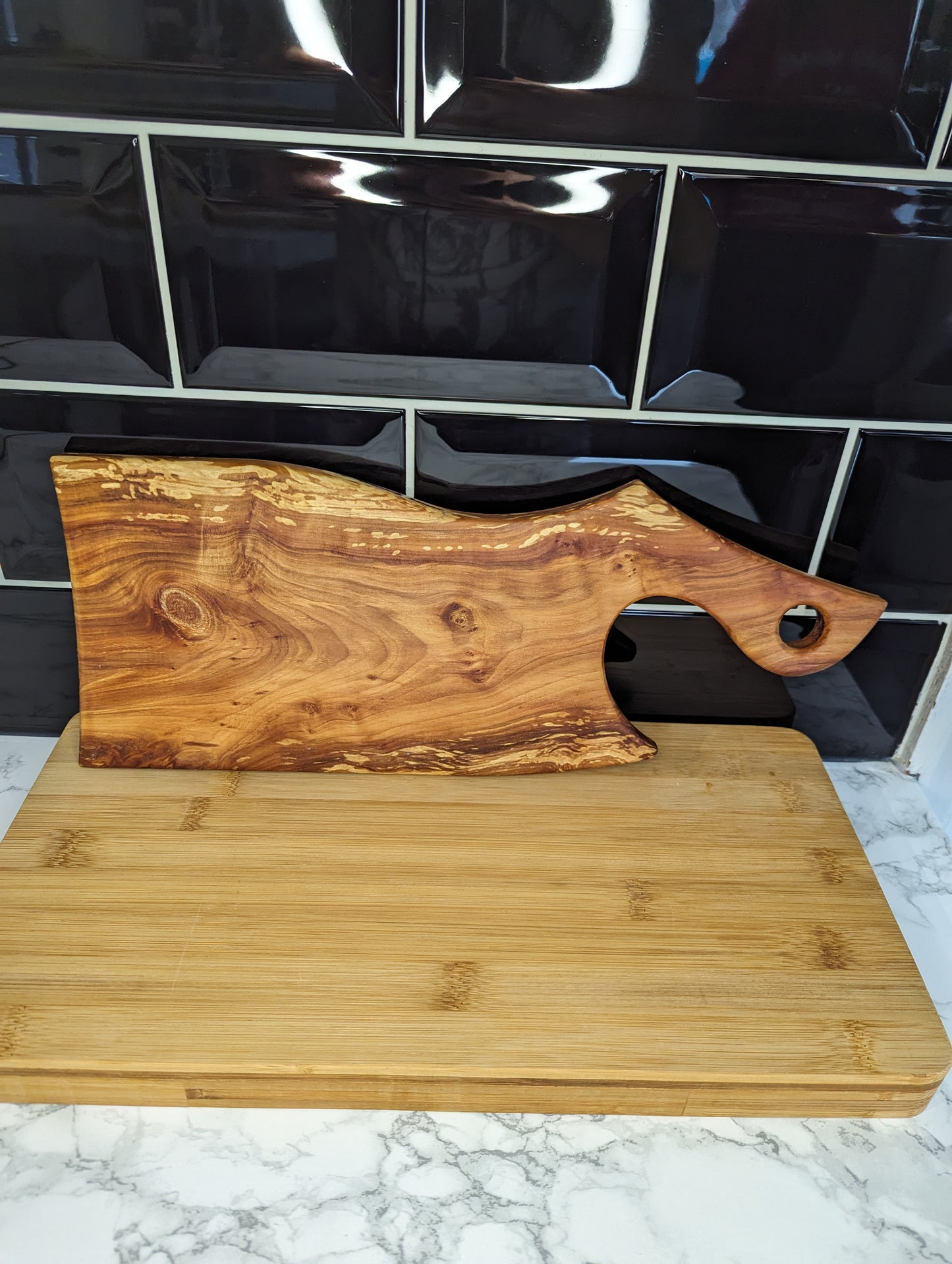 Apple cleaver shaped serving board